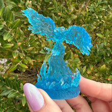 Load image into Gallery viewer, Blue phoenix with wings outstretched and fire extending to wrap around her talon feet
