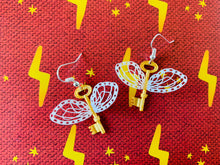 Load image into Gallery viewer, Flying Key Earrings/ Winged Keys/ Charms Lesson/ Magical Accessories/ Theme Park Outfit/ Fantasy/ Bookworm Nerd Gift/ Wtichy/ Bounding