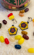 Load image into Gallery viewer, Fudge Frog Earrings/ Wizarding Earrings/ Candy Jewelry/ Quirky Accessories/ Food Dangle Earrings/ Cosplay/ Fandom Gift/ Nerdy