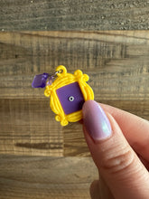 Load image into Gallery viewer, Yellow Friends Peephole Frame USB C Dust Plug | Electronic Charm | E Reader Accessory
