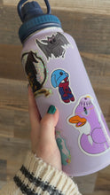 Load and play video in Gallery viewer, Spidey Wearing Bunny Hat Waterproof Sticker | Comics Waterbottle Decor
